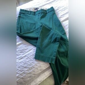 Emerald green, ankle length, stretchy pants.